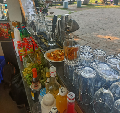 Experience unparalleled elegance with a bespoke bar setup by Drinks by Mo, meticulously crafted to elevate any event with style and sophistication.