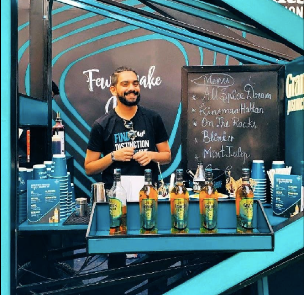 Experience the impeccable service of Drinks by Mo as Mohit skillfully tends to the bar at a prestigious event, ensuring every guest enjoys a memorable and delightful beverage experience.