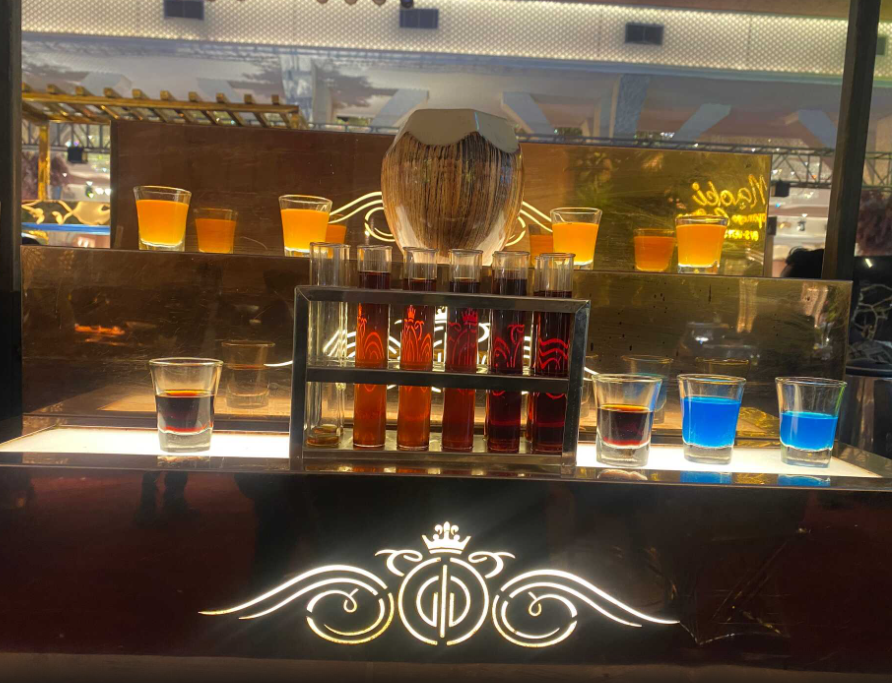 Elegant bar setup with The Cocktail Factory's drinks on display