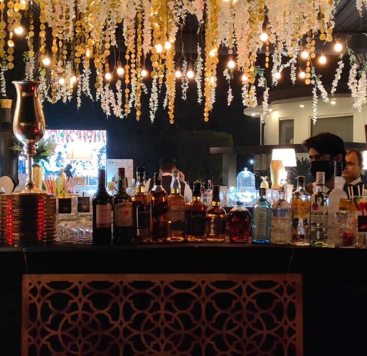 Elegant bar setup with The Gentleman Bar Events' signature drinks on display